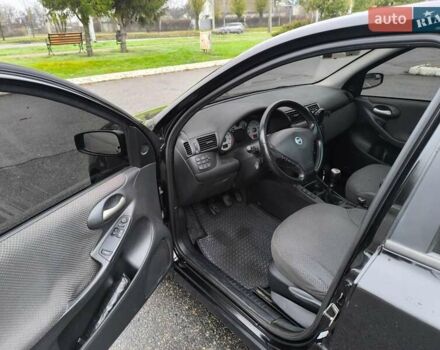 Черный Фиат Стило, объемом двигателя 1.6 л и пробегом 156 тыс. км за 4500 $, фото 9 на Automoto.ua