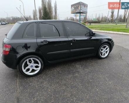 Черный Фиат Стило, объемом двигателя 1.6 л и пробегом 156 тыс. км за 4500 $, фото 5 на Automoto.ua