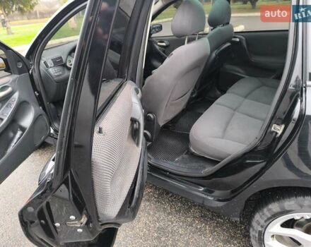 Черный Фиат Стило, объемом двигателя 1.6 л и пробегом 156 тыс. км за 4500 $, фото 10 на Automoto.ua