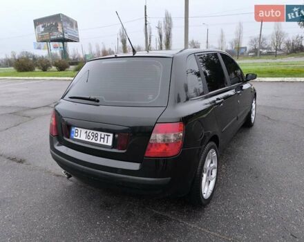 Черный Фиат Стило, объемом двигателя 1.6 л и пробегом 156 тыс. км за 4500 $, фото 6 на Automoto.ua