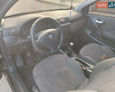 Черный Фиат Стило, объемом двигателя 1.6 л и пробегом 203 тыс. км за 2700 $, фото 11 на Automoto.ua