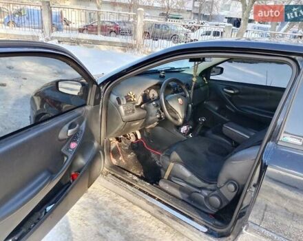 Черный Фиат Стило, объемом двигателя 2.4 л и пробегом 276 тыс. км за 3500 $, фото 1 на Automoto.ua