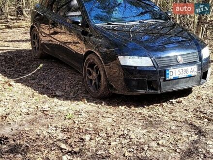 Черный Фиат Стило, объемом двигателя 2.4 л и пробегом 260 тыс. км за 3500 $, фото 1 на Automoto.ua