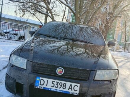 Черный Фиат Стило, объемом двигателя 2.4 л и пробегом 276 тыс. км за 3500 $, фото 1 на Automoto.ua