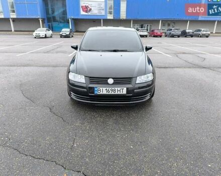 Черный Фиат Стило, объемом двигателя 1.6 л и пробегом 156 тыс. км за 4500 $, фото 1 на Automoto.ua