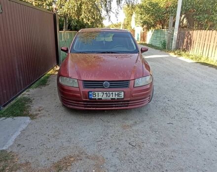 Красный Фиат Стило, объемом двигателя 1.6 л и пробегом 305 тыс. км за 3200 $, фото 7 на Automoto.ua