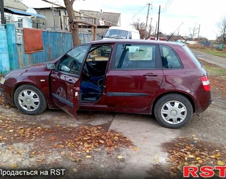 Красный Фиат Стило, объемом двигателя 1.7 л и пробегом 260 тыс. км за 4000 $, фото 1 на Automoto.ua