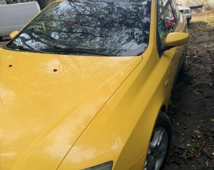 Жовтий Фіат Стіло, об'ємом двигуна 1.6 л та пробігом 250 тис. км за 2608 $, фото 1 на Automoto.ua