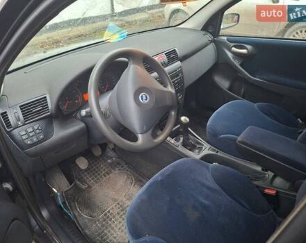 Серый Фиат Стило, объемом двигателя 1.8 л и пробегом 206 тыс. км за 2550 $, фото 5 на Automoto.ua