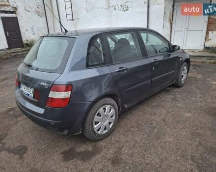 Серый Фиат Стило, объемом двигателя 1.8 л и пробегом 206 тыс. км за 2550 $, фото 2 на Automoto.ua