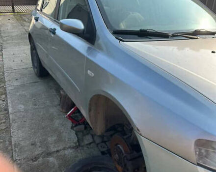 Серый Фиат Стило, объемом двигателя 1.91 л и пробегом 270 тыс. км за 1450 $, фото 1 на Automoto.ua