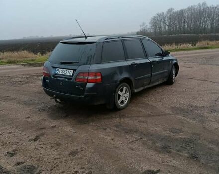 Серый Фиат Стило, объемом двигателя 1.91 л и пробегом 342 тыс. км за 3900 $, фото 2 на Automoto.ua