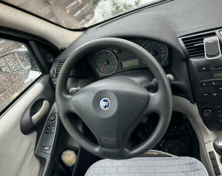Серый Фиат Стило, объемом двигателя 1.6 л и пробегом 170 тыс. км за 3300 $, фото 4 на Automoto.ua