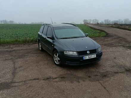 Серый Фиат Стило, объемом двигателя 1.91 л и пробегом 342 тыс. км за 3900 $, фото 1 на Automoto.ua