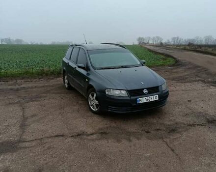 Серый Фиат Стило, объемом двигателя 1.91 л и пробегом 342 тыс. км за 3900 $, фото 1 на Automoto.ua