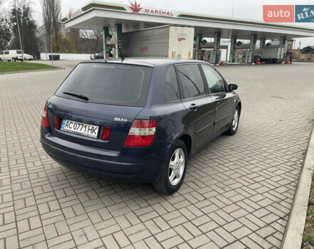 Синий Фиат Стило, объемом двигателя 1.91 л и пробегом 295 тыс. км за 2700 $, фото 4 на Automoto.ua