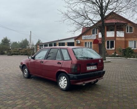 Красный Фиат Типо, объемом двигателя 1.4 л и пробегом 125 тыс. км за 824 $, фото 1 на Automoto.ua