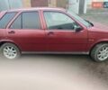 Червоний Фіат Тіпо, об'ємом двигуна 1.6 л та пробігом 300 тис. км за 1600 $, фото 1 на Automoto.ua