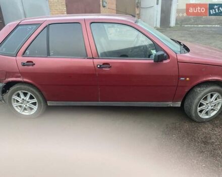 Червоний Фіат Тіпо, об'ємом двигуна 1.6 л та пробігом 300 тис. км за 1600 $, фото 1 на Automoto.ua