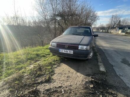 Красный Фиат Типо, объемом двигателя 1.4 л и пробегом 458 тыс. км за 700 $, фото 1 на Automoto.ua