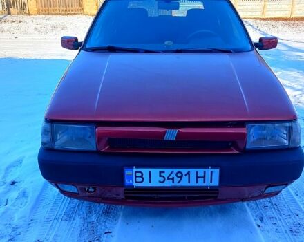 Червоний Фіат Тіпо, об'ємом двигуна 1.6 л та пробігом 240 тис. км за 2600 $, фото 1 на Automoto.ua