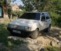 Белый Фиат Уно, объемом двигателя 1 л и пробегом 277 тыс. км за 1067 $, фото 1 на Automoto.ua