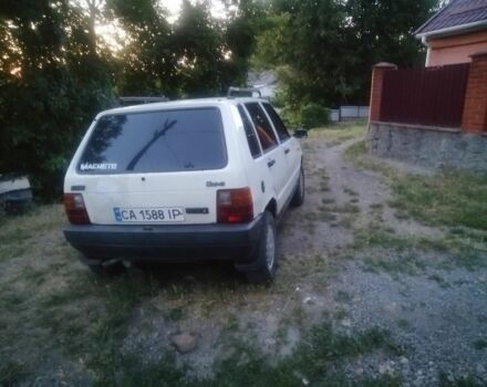 Белый Фиат Уно, объемом двигателя 1 л и пробегом 277 тыс. км за 1041 $, фото 4 на Automoto.ua