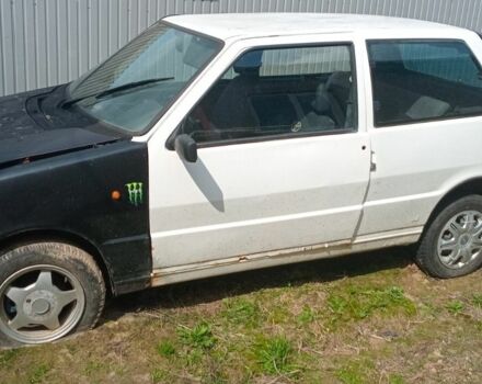Белый Фиат Уно, объемом двигателя 1 л и пробегом 438 тыс. км за 297 $, фото 1 на Automoto.ua