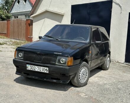 Черный Фиат Уно, объемом двигателя 1 л и пробегом 250 тыс. км за 800 $, фото 1 на Automoto.ua