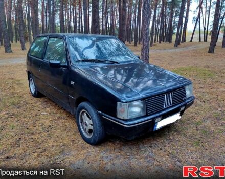 Черный Фиат Уно, объемом двигателя 1 л и пробегом 362 тыс. км за 750 $, фото 1 на Automoto.ua