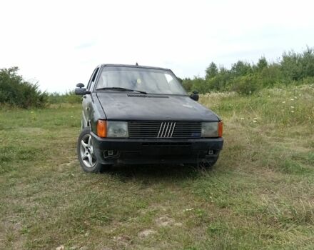 Черный Фиат Уно, объемом двигателя 1.5 л и пробегом 218 тыс. км за 400 $, фото 1 на Automoto.ua