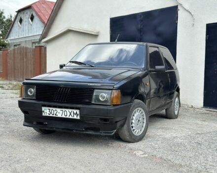 Черный Фиат Уно, объемом двигателя 1 л и пробегом 250 тыс. км за 800 $, фото 1 на Automoto.ua