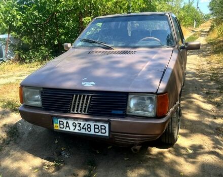 Коричневий Фіат Уно, об'ємом двигуна 1 л та пробігом 208 тис. км за 600 $, фото 5 на Automoto.ua