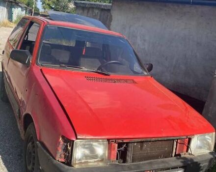 Червоний Фіат Уно, об'ємом двигуна 1.5 л та пробігом 250 тис. км за 193 $, фото 4 на Automoto.ua