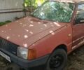 Красный Фиат Уно, объемом двигателя 1 л и пробегом 194 тыс. км за 550 $, фото 1 на Automoto.ua