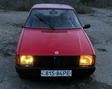 Красный Фиат Уно, объемом двигателя 1.1 л и пробегом 196 тыс. км за 1321 $, фото 2 на Automoto.ua