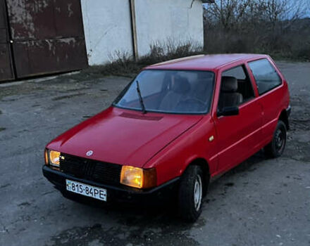 Красный Фиат Уно, объемом двигателя 1.1 л и пробегом 196 тыс. км за 1321 $, фото 1 на Automoto.ua