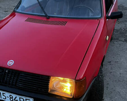 Красный Фиат Уно, объемом двигателя 1.1 л и пробегом 196 тыс. км за 1321 $, фото 4 на Automoto.ua