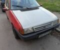 Красный Фиат Уно, объемом двигателя 1.4 л и пробегом 200 тыс. км за 300 $, фото 1 на Automoto.ua