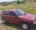 Червоний Фіат Уно, об'ємом двигуна 1 л та пробігом 207 тис. км за 1000 $, фото 1 на Automoto.ua