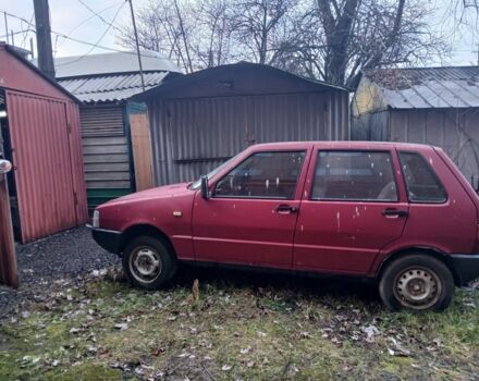 Красный Фиат Уно, объемом двигателя 1.1 л и пробегом 167 тыс. км за 175 $, фото 1 на Automoto.ua
