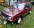 Красный Фиат Уно, объемом двигателя 1 л и пробегом 234 тыс. км за 1201 $, фото 1 на Automoto.ua