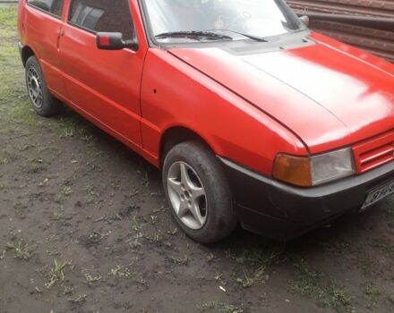 Красный Фиат Уно, объемом двигателя 9 л и пробегом 250 тыс. км за 709 $, фото 1 на Automoto.ua