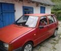 Красный Фиат Уно, объемом двигателя 0.9 л и пробегом 320 тыс. км за 846 $, фото 1 на Automoto.ua
