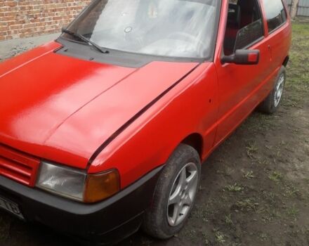 Красный Фиат Уно, объемом двигателя 9 л и пробегом 250 тыс. км за 848 $, фото 1 на Automoto.ua
