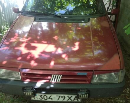 Красный Фиат Уно, объемом двигателя 1 л и пробегом 198 тыс. км за 721 $, фото 1 на Automoto.ua