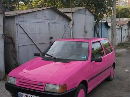 Красный Фиат Уно, объемом двигателя 1 л и пробегом 200 тыс. км за 1800 $, фото 1 на Automoto.ua