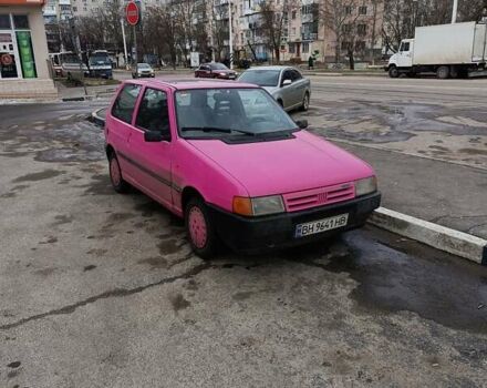 Красный Фиат Уно, объемом двигателя 1 л и пробегом 203 тыс. км за 969 $, фото 1 на Automoto.ua