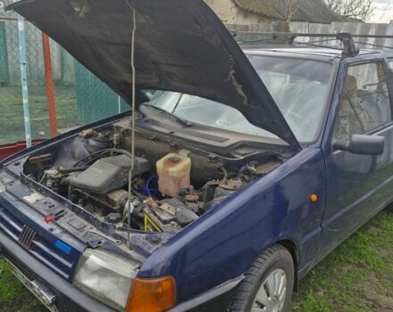 Синий Фиат Уно, объемом двигателя 1 л и пробегом 290 тыс. км за 900 $, фото 1 на Automoto.ua