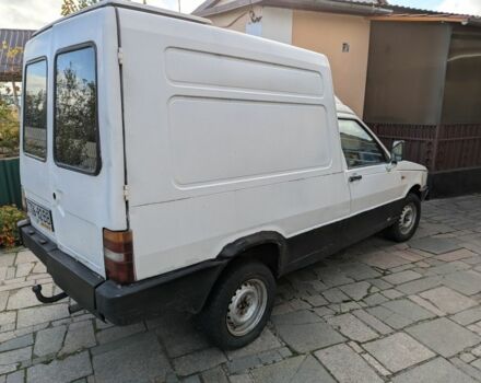Белый Фиат Fiorino, объемом двигателя 1 л и пробегом 296 тыс. км за 550 $, фото 2 на Automoto.ua